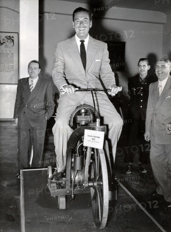 Errol FLYNN on a Daimler two-wheeler from 1885