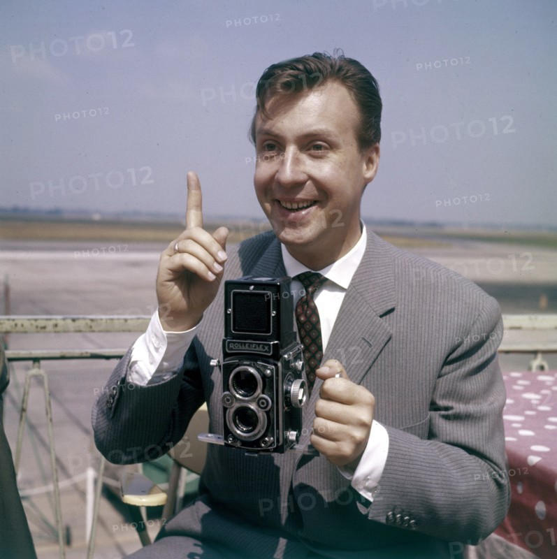 Peter ALEXANDER taking photos