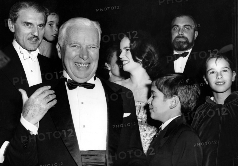 Charlie CHAPLIN with his wife and son Michael, 1957