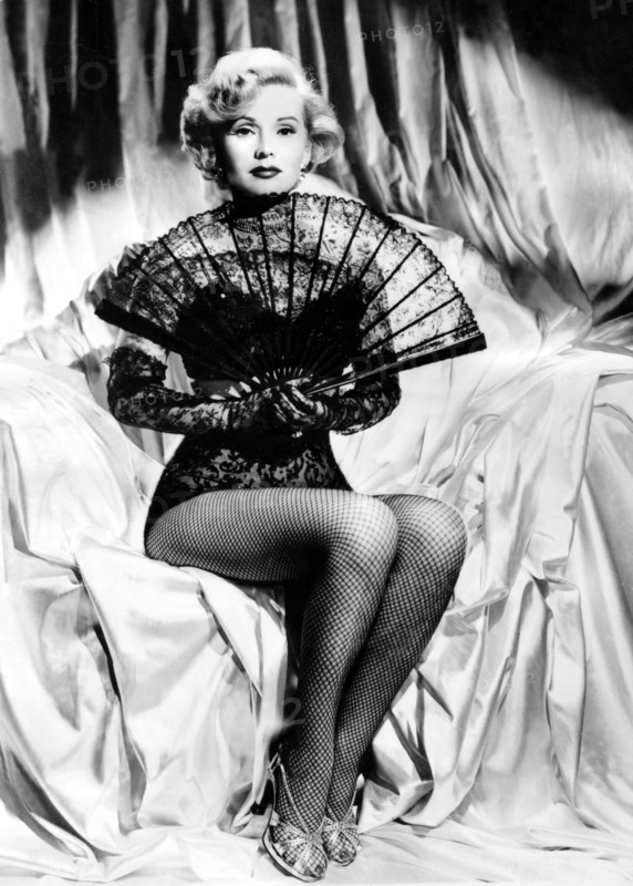 Zsa Zsa GABOR with fan and fishnet stockings
