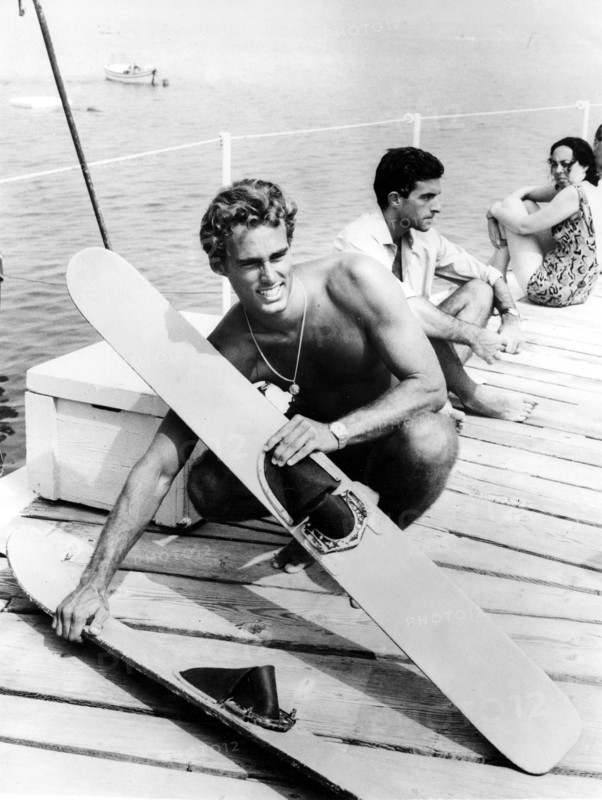 Sean FLYNN with water skis, undated