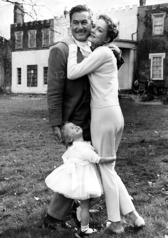 Errol FLYNN with wife Patrice WYMORE and daughter Arnelia Roma FLYNN, 1956