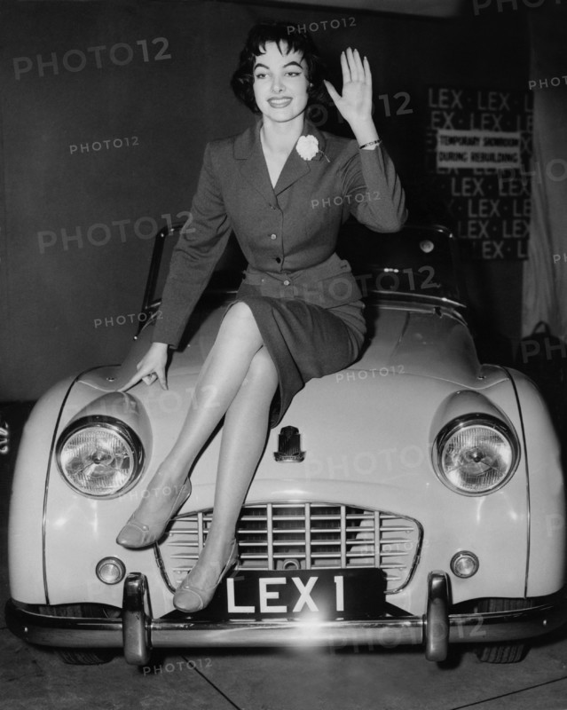 Petra SCHÜRMANN sits on a Triumph TR3, London 1956