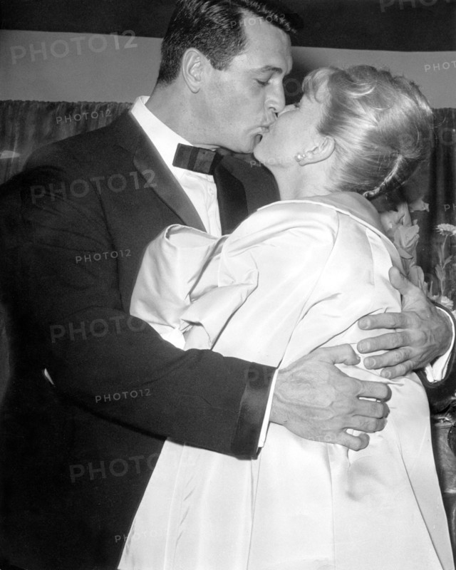Rock HUSON and Doris DAY kiss at a film premiere