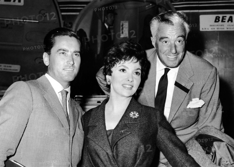 Gina LOLLOBRIGIDA with her husband and Vittorio DE SICA, 1957