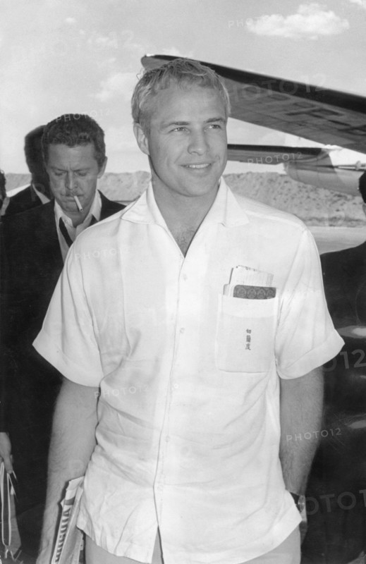 Marlon BRANDO, arriving at Madrid airport