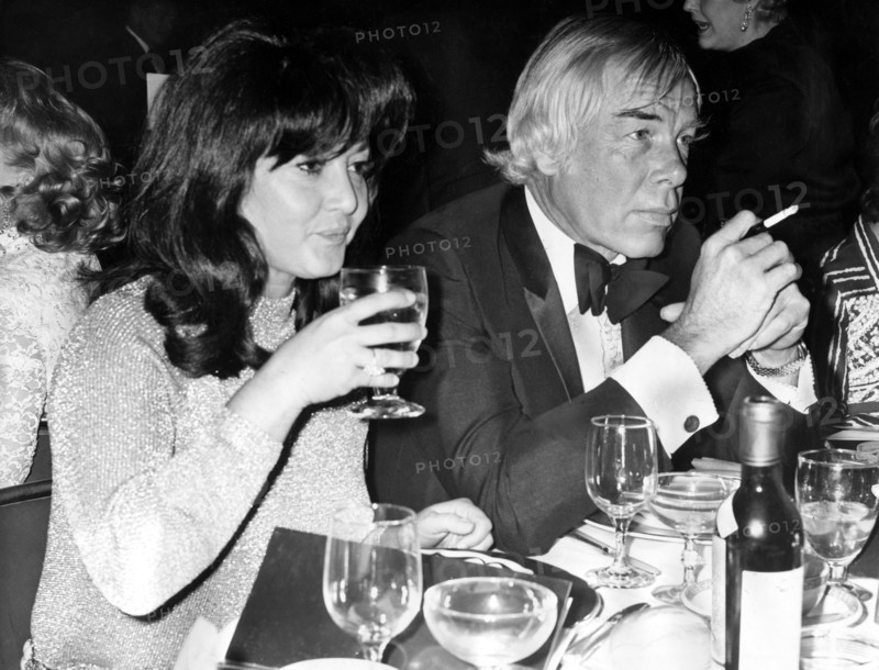 Michelle TRIOLA and Lee MARVIN during a gala party