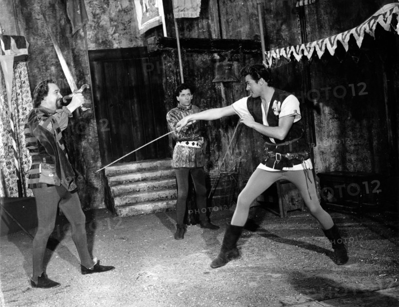 Roger Moore sword fighting while filming 'Ivanhoe', 1958