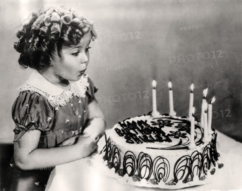 Shirley TEMPLE on her 7th birthday, 1935