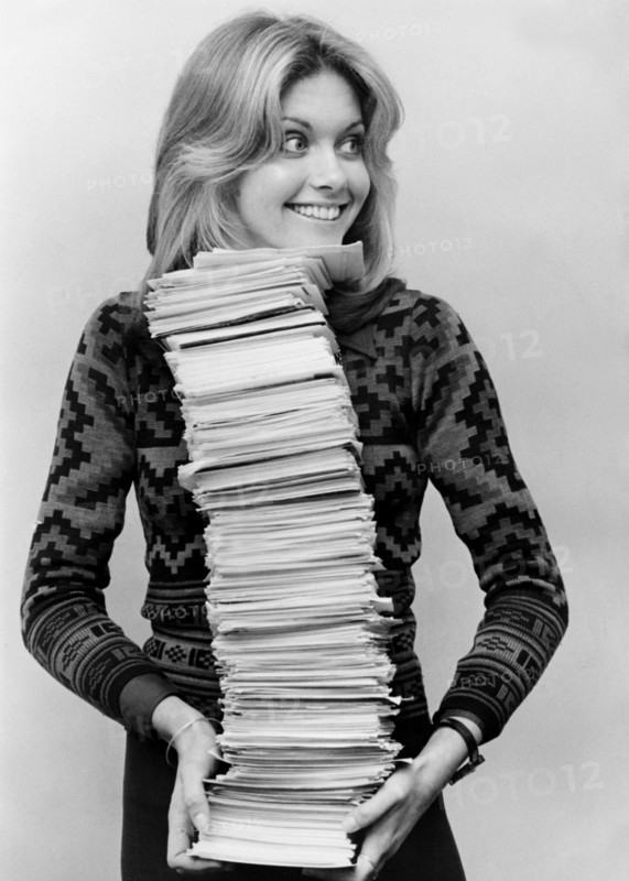 Olivia NEWTON-JOHN with ballot papers, London 1974