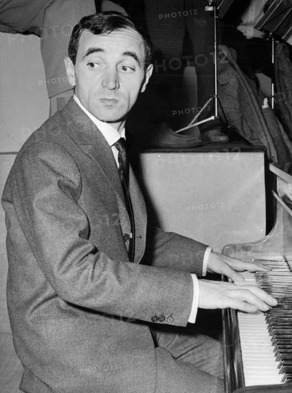 Charles AZNAVOUR playing piano, ca. 1965