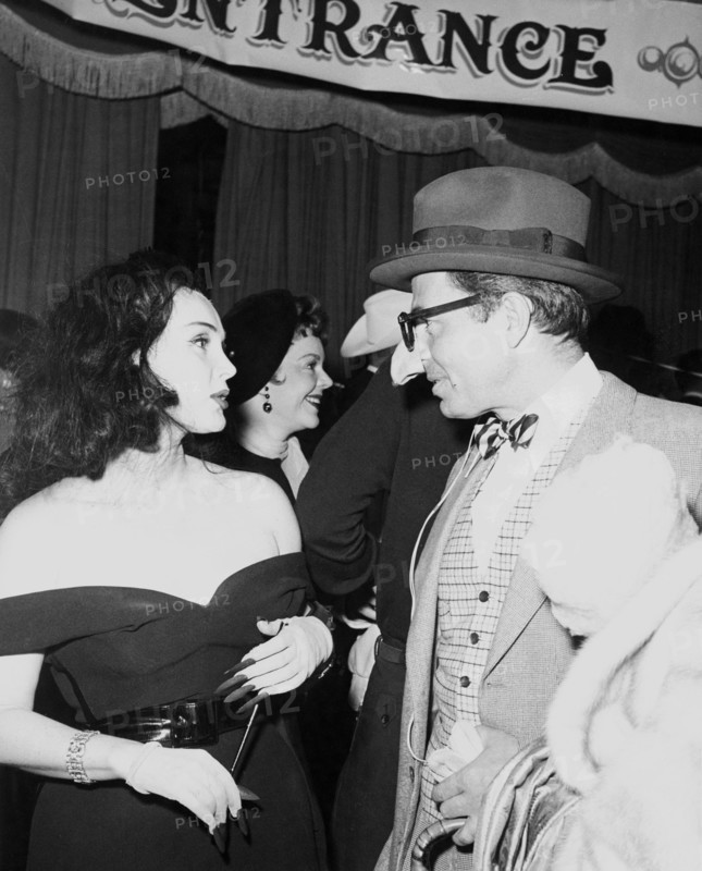 Zsa Zsa GABOR and James MASON at a costume party
