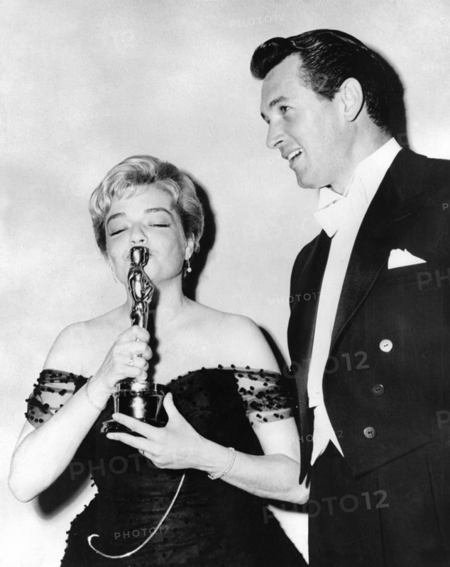 Simone SIGNORET and Charlton HESTON after the Oscars in 1960