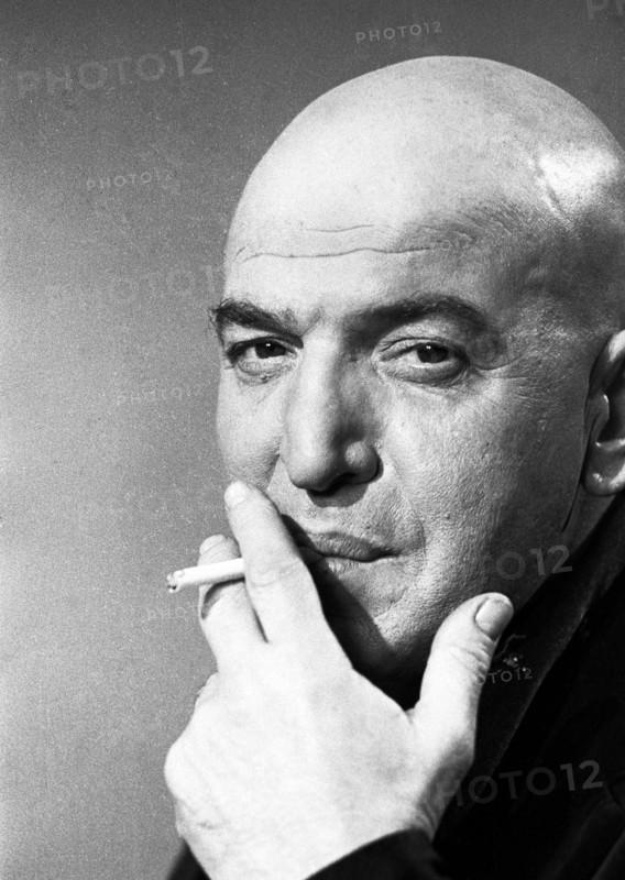 Telly SAVALAS with cigarette, portrait