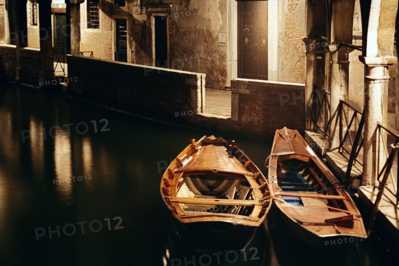 Two boats on the canal in Venice