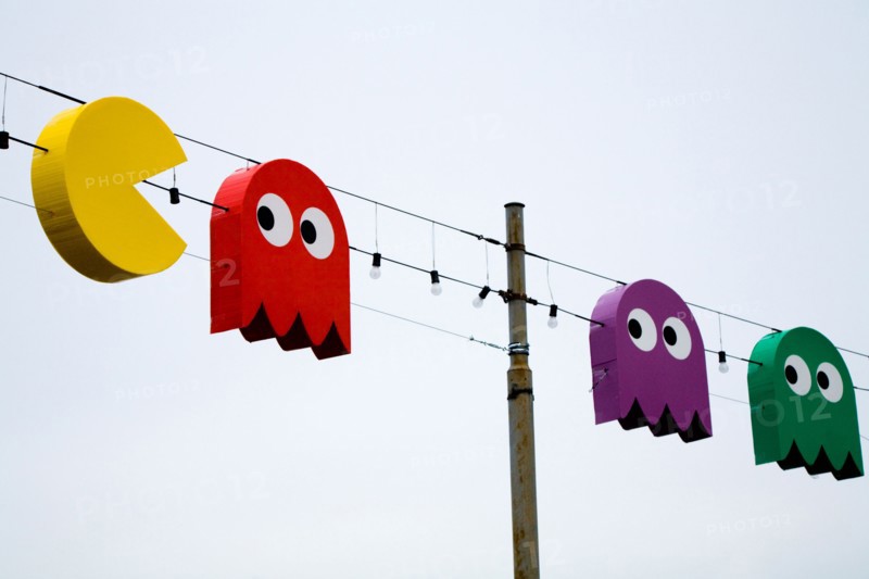 Swiss Christmas lights in shape of Pac Man / Pac Men / Pacman video game characters, by Lac / Lake Geneve. Geneva. Switzerland.