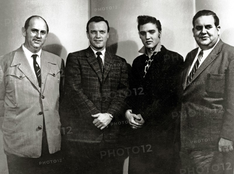 Elvis Presley with Colonel Tom Parker, Eddy Arnold and Steve Sholes at the RCA Recording studios for his last recording session before leaving for his 2 year tour of duty in the Army (March 10th 1958) 
File Reference # 33848-526THA