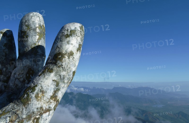Danang Vietnam January 6, 2020 : giant hands holding bridge or golden bridge at Ba Na hills unique landmark in Vietnam