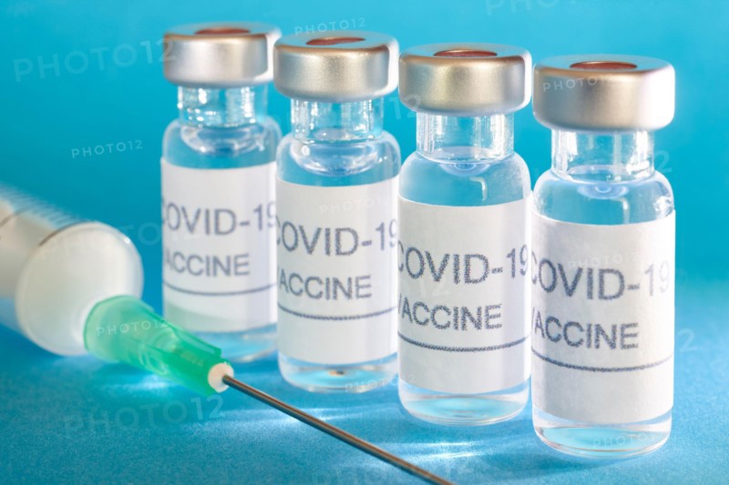 Covid-19 vaccine vials. Coronavirus pandemic infection. Global prevention vaccination