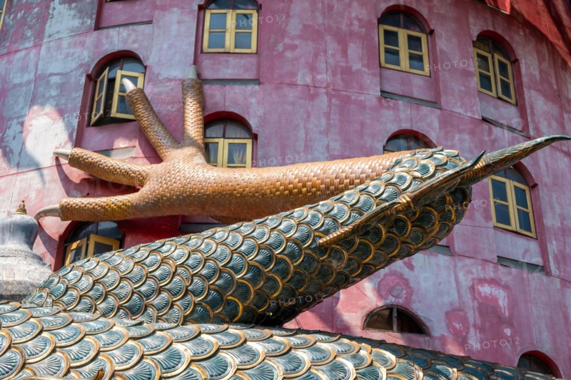 Nakhon Pathom, Thailand-February, 2020:Wat Samphran Dragon Temple in the Sam Phran District.Buddhist temple has a dragon wrapped around it.