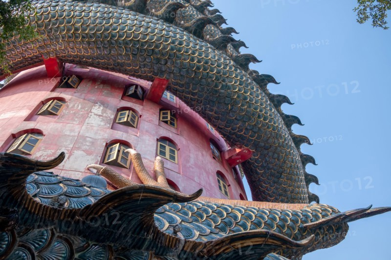 Nakhon Pathom, Thailand-February, 2020:Wat Samphran Dragon Temple in the Sam Phran District.Buddhist temple has a dragon wrapped around it.