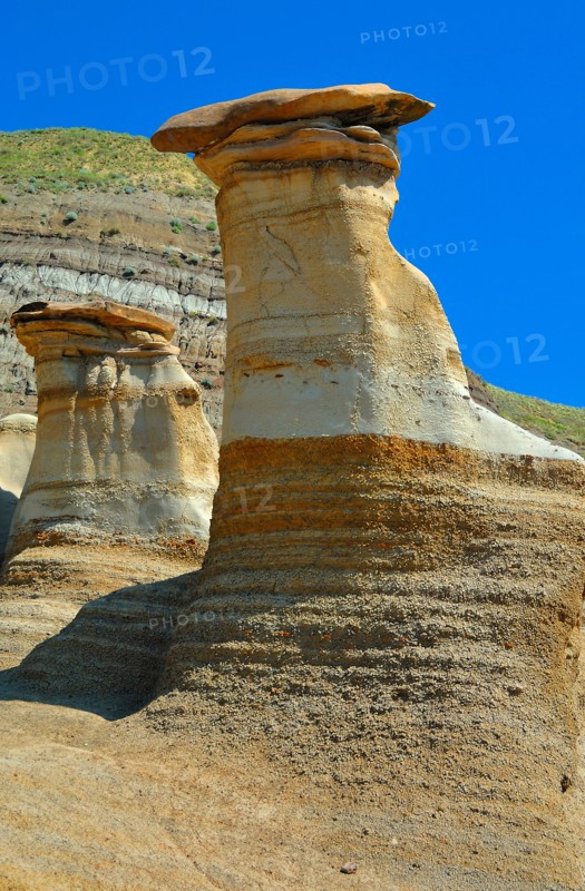 Hoodoos at the Badlands in Drumheller, Alberta, Canada, North America. Vertical format
