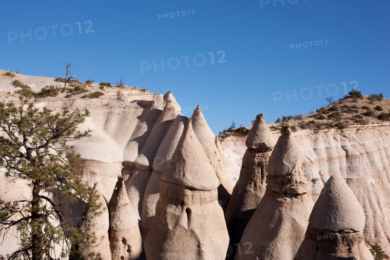 KASHA-KATUWE TENT ROCK cone shaped rock carved out of a volcanic deposit (pumice, ash). New Mexico, USA.