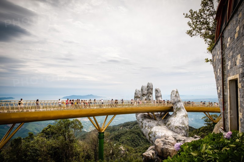 The Golden Bridge /Vietnamese: C?u Vàng) is a pedestrian bridge located in the Sun World resort in Bà Nà Hills near Da Nang in Vietnam.