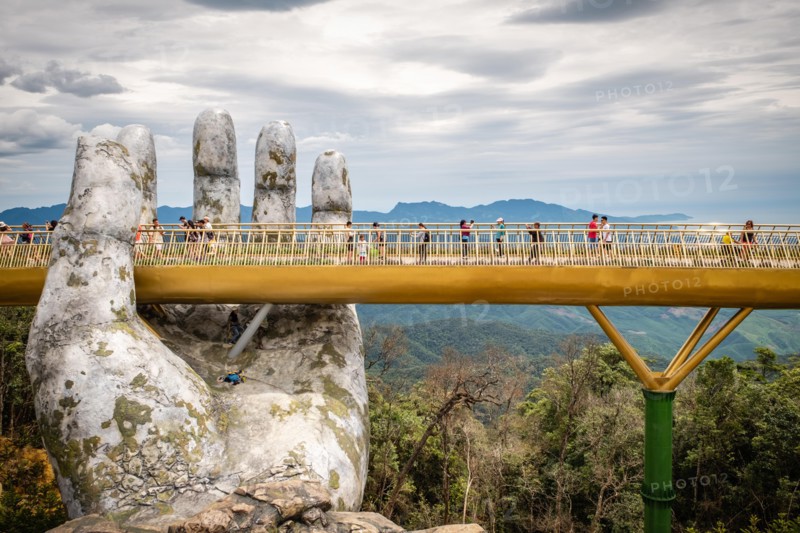 The Golden Bridge /Vietnamese: C?u Vàng) is a pedestrian bridge located in the Sun World resort in Bà Nà Hills near Da Nang in Vietnam.