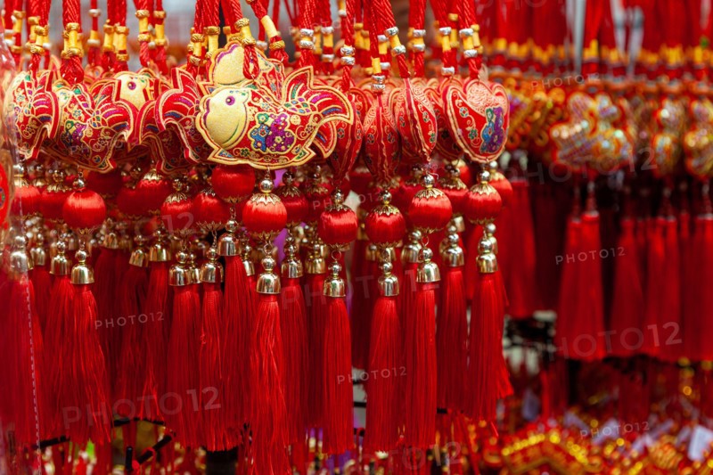 Chinese New Year ornaments on sale in Chinatown. These common ornaments have the Chinese words meaning Blessings and Peace printed on them. They are t