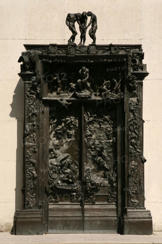 The Gates of Hell (La Porte de l'Enfer) by French sculptor Auguste Rodin seen in the garden of The Musee Rodin in Paris, France.