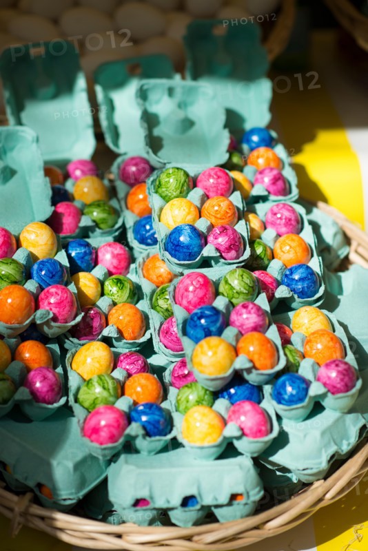 Colorful marble Easter eggs for sale at outdoor market, Paris, France