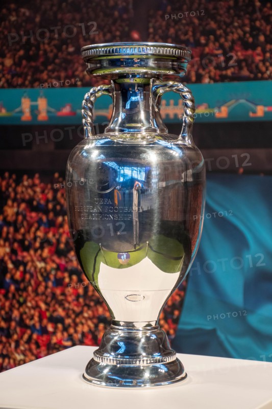 Original UEFA European Championship Trophy with stadium background, vertical