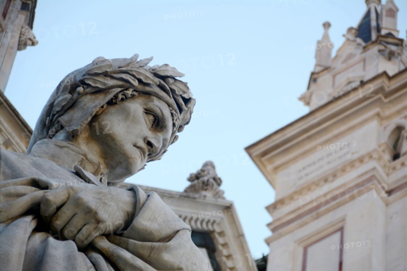 The statue of Dante Alighieri, author of the Divine Comedy, in front of the Basilica of Santa Croce in the heart of Florence.
