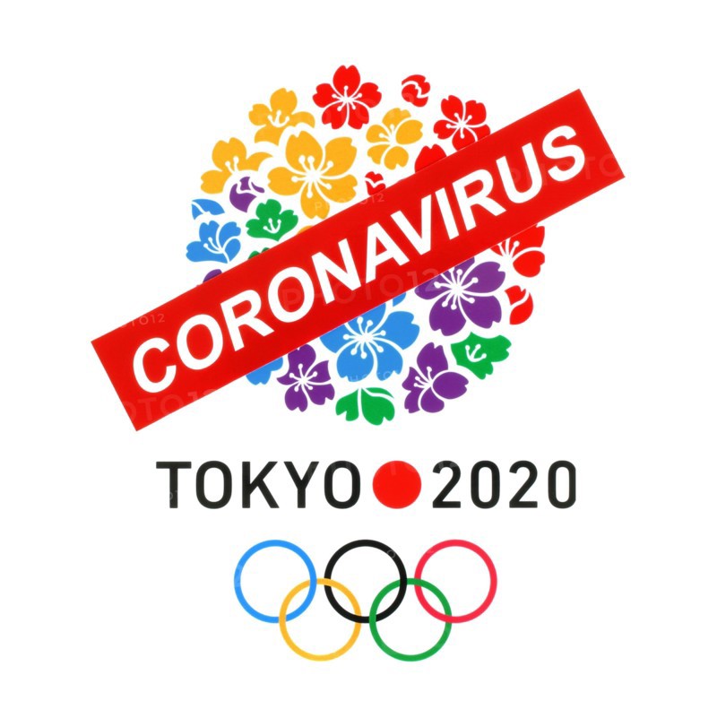 Kiev, Ukraine - March 20, 2020: Tokyo logo as Candidate City for Summer Olympic Games 2020 printed on paper and crossed out by paper sign Coronavirus.