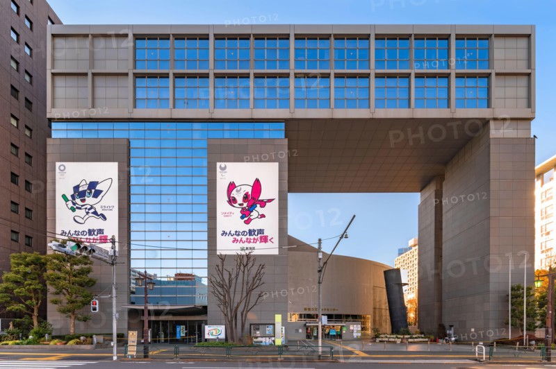 tokyo, japan - january 02 2021: Shinjuku Cosmics Center building decorated with posters of the 2020 Olympic and Paralympic Summer Games depicting the