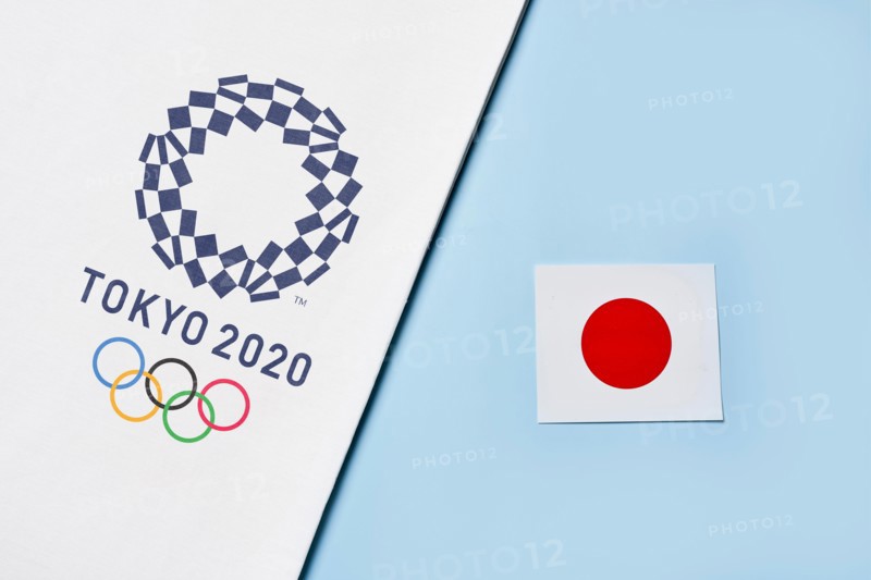Tashkent, Uzbekistan - March 4, 2021: 2020 A towel with TOKYO 2020 Olympic games logotype and national flag of Japan