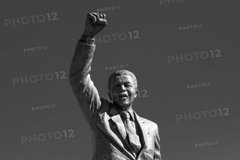 Artistic black and white portrait of a bronze statue near the Drakenstein Correctional Centre in Paarl near Cape Town, South Africa.