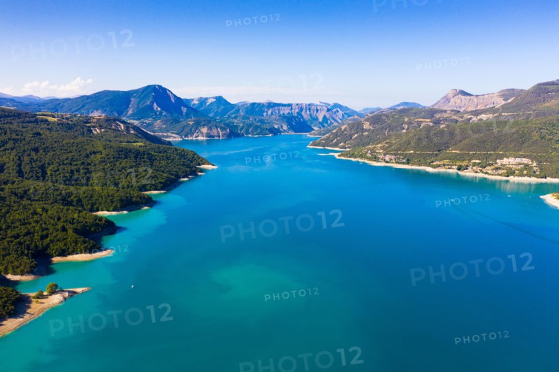 Panoramic scenic view of Serre-Poncon Lake and Alps in southeast France