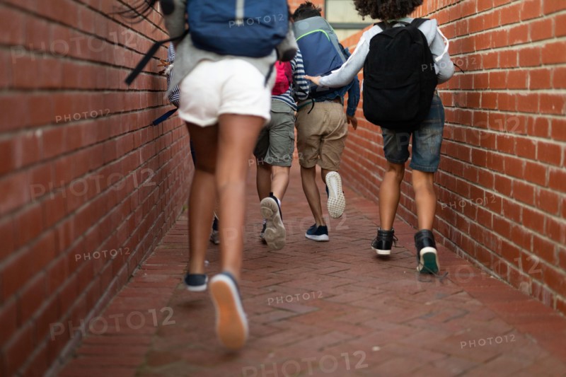 Low section of group of kids running