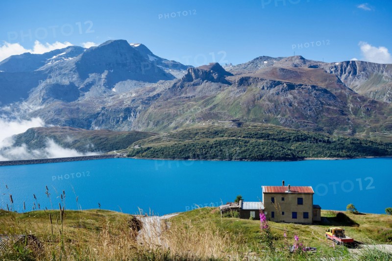 Summer view of the artificial Mont Cenis Lake, in the Savoy department near Lanslevillard, Rhone-Alpes, France near the italian border