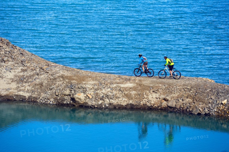 Mountain biking around Alp lake Lac du Mont Cenis, France, Savoie