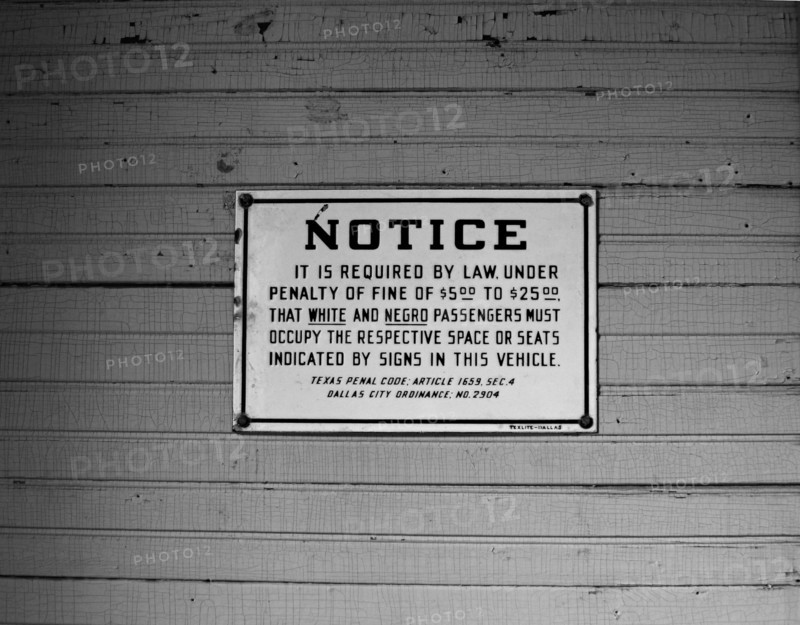 Pre civil rights sign requiring separate seating for Whites and Negroes on old railroad depot historic Buffalo Gap, Texas, USA
