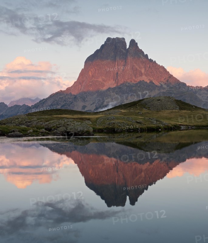 Reflections at sunset of Pic du Midi D'Ossau in the Lac D Ayous
