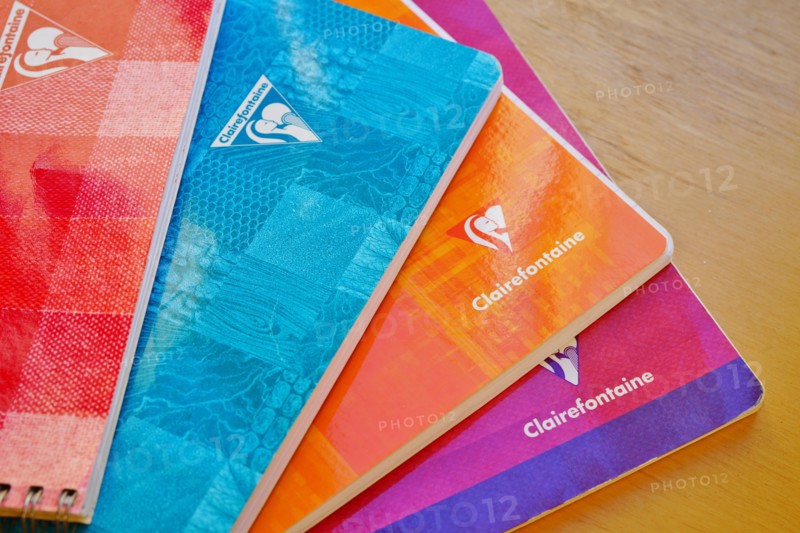 PARIS, FRANCE -21 OCT 2019- View of colorful notebooks from French stationery brand Clairefontaine, known for its strong paper products.