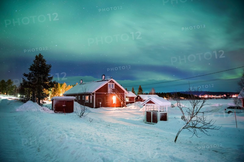 Northern Lights (aurora borealis) over Akaslompolo, a small town in Finnish Lapland, inside Arctic Circle in Finland
