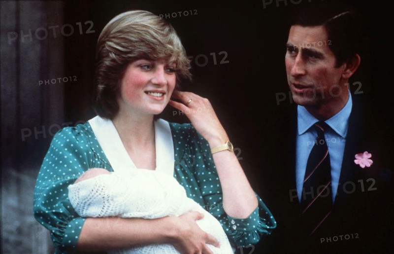 Diana, Princess of Wales, wearing her favourite maternity dress, with newly-born baby Prince William and the Prince Charles, Prince of Wales in June 1982.