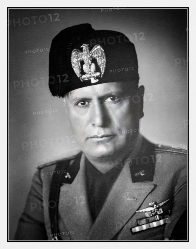 Benito Mussolini World War II 1940 studio portrait in uniform. 
(1883–1945) 1940 Benito Amilcare Andrea Mussolini, who went by the nickname “Il Duce” (“the Leader”), was an Italian dictator who created the Fascist Party in 1919 and eventually held all the power in Italy as the country’s prime minister from 1922 until 1943. An ardent socialist as a youth, Mussolini followed in his father's political footsteps but was expelled by the party for his support of World War I. As dictator during World War II, he overextended his forces and was eventually killed by his own people in Mezzegra, Italy.