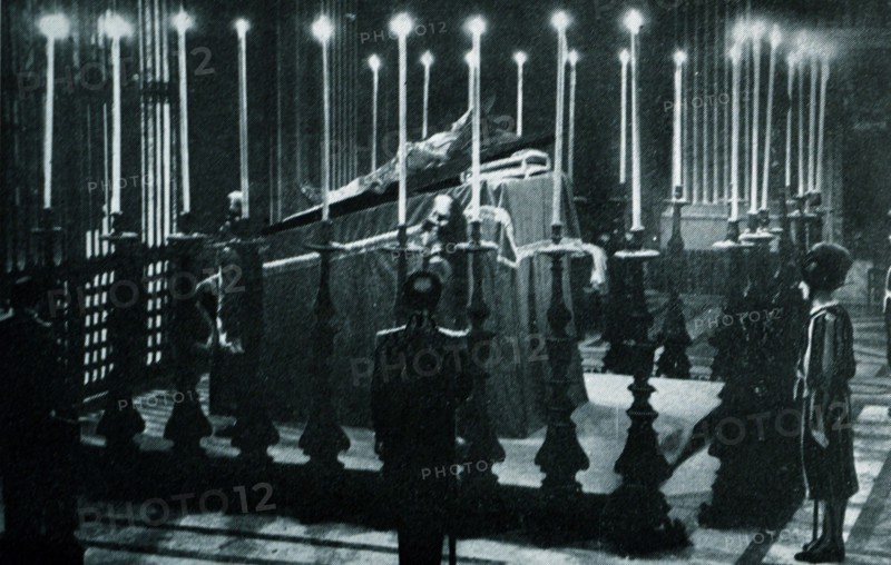 Black and white photograph of the body of Pope Pius XI (1857-1939; pope from 1922) on display in St. Peter's Basilica in Rome.