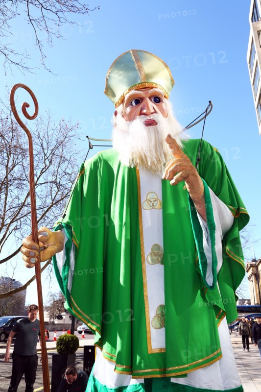 London, UK. 16th March 2014. A giant figure of St. Patrick takes part in the St. Patrick's Day Parade 2014 in London, England Credit:  Paul Brown/Alamy Live News